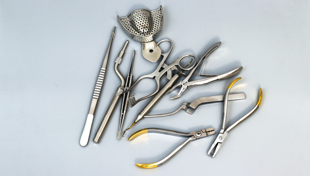 Instrument craftsman hand-filing surgical steel at Sirgikal facility